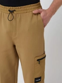 CK Calvin Klein Jogpants Mit Reißverschlusstaschen - Camel 7 CK Calvin Klein Jogpants Mit Reißverschlusstaschen - Camel -BE EDGY Shop 6573ahi36oql8k2b952l2j9o6oslaii9ap656ii8a1944k1i9orkohib6srjcdab9grk6hada5158gik953m8opjclh3ee9j75gj6c9kc8q6ae1ic4om2oho6dj66cj46oom2cg