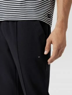 Tommy Hilfiger Jogpants Mit Bundfalten Modell 'DRESS CASUAL PINTUCK' - Marineblau -BE EDGY Shop 6l746c2d84p4ik288gpjika18d3kkdpma95kulhj8t436dikacpl0iiead1lag9nakr3ggpj9p852li5a8o6ao9ic8p32dr46kpj4phk69j3ie9o71hj0chh74s66oj3ccrjac8