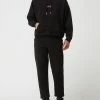 YOUNG POETS SOCIETY Jogpants Mit Reißverschlusstaschen Modell 'Aris' - Schwarz -BE EDGY Shop 8h5j0h9l8p248gai6153elab752k8khh9594ulih9cojeeac6p84ehac9h9l0dil659kcii974o4ukima8o68d9p6lij6phl6hgmao9k6hij6o9o65ijgp1pcgo3aohi65ij2co